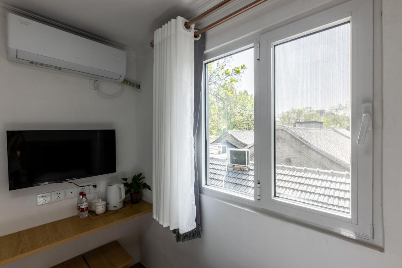 Happy Dragon Hotel -- Nearby Tiananmen Square & Forbidden City & Wangfujing Street & Line 5,6,8 Subway Nearby & Free Coffee & Free Laundry & Fluent English Speaking & Tourist Attractions Ticket Service & Free Wifi Unlimited For Western Software Pequim Exterior foto